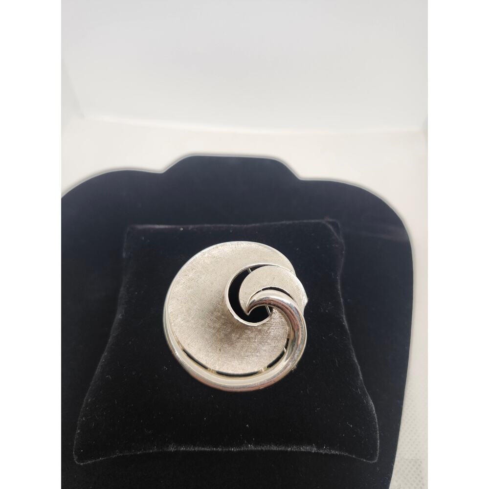 Crown Trifari Silver tone swirl brooch